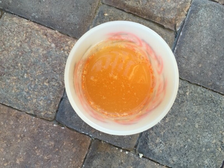 Orange Nutrimatix drink in a cup