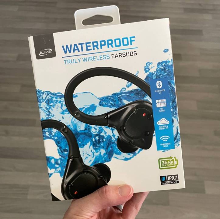 iLive Waterproof Truly Wireless Earbuds package being held 
